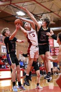 Photo by John Fisken
Coupeville sophomore Logan Downes takes a shot during the Wolves senior night game against Friday Harbor Jan. 19. Despite trailing during a low-scoring first half, the Coupeville players managed a 49-34 victory, maintaining their undefeated season.