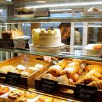 (Photo by Kira Erickson/South Whidbey Record)
Barista Kelsey Coutts grabs a croissant from the case at Seabiscuit Bakery.