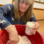 Resident Carleen Straub makes jars of homemade epsom salt bath soaks. (Photo provided)
