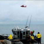 Photo provided
An Island County Sheriffs Office boat and a Coast Guard helicopter set out to retrieve a body near Whidbey Island.