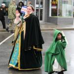 An Oak Harbor queen and princess walk in the parade.