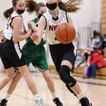 Photo by John Fisken
Scarlett Nations plays with her eighth grade team in a basketball game against LaVenture Middle School, one of eight games the team won handily for an undefeated season.