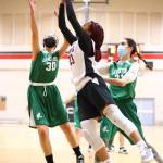 Photo by John Fisken
Zoe Scott goes for a basket in a game against LaVenture Middle School.