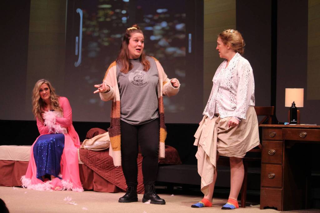 Photo by Karina Andrew/Whidbey News-Times
From left, Abby Thuet, Dianna Gruenwald and Tamra Sipes practice a scene from The Taming.