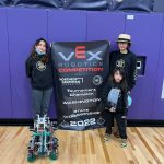 Photo provided
Misaella Jomiya Serrantes, left, Mikayla Jomika Serrantes, back right, and Mikoilo Jomiko Serrantes compete at the VEX Robotics State Championship March 13.