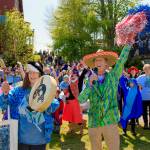 Photo by David Welton
Susan Berta, co-founder of the Orca Network, leads the parade during a previous year.