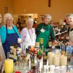 Photo provided
Volunteers at a previous sale gather around a table of housewares.