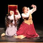 Megan Croft, left, and Gabby Eaton practice Some Things are Meant to Be from Little Women. (Photo by Karina Andrew/Whidbey News-Times)