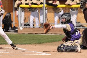 Parker Anderson catches during the game. (Photo by John Fisken)