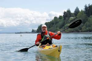 Photo by Kira Erickson/South Whidbey Record
Whidbey Island Kayaking Instructor Ryan DJay paddles in a kayak at the South Whidbey Harbor in Langley.