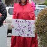 A Whidbey resident dresses as a handmaid from Margaret Atwoods dystopian The Handmaids Tale. (Photo by Karina Andrew/Whidbey News-Times)