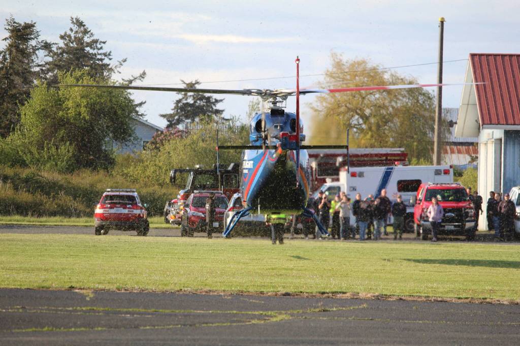 A Life Flight helicopter lands near the A. J. Eisenberg Airport May 9 during a joint training with Whidbey Island emergency rescue agencies. (Photo by Karina Andrew/Whidbey News-Times)