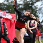 Junior Carolyn Lhamon competes in shot put. She won second place in this event with a distance of 30 feet, 11.5 inches, a personal best. Lhamon also won first place in discus with a distance of 94 feet, 9 inches, and first place in the 4 x 100 meter relay with teammates Ava Mitten, Claire Mayne and JaKenya Hoskins. (Photo by John Fisken)