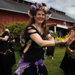 Aristana Firethorne, center, belly dances at the Greenbank Farm. (Photo by David Welton)
