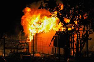 Photo by Bryan Fick/WestCoast Fire Media
A fire consumed a shed on an Oak Harbor property Wednesday night, killing two baby goats that were living inside.