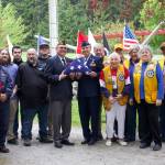 From L to R: Kelly Davidson, Chairman; Michael Douglas, Maple Leaf Cemetery Manager; Jonathan Brown, Technical Account Manager, Whidbey Tech Solutions; Alex Felger, Audio Engineer, ZnAvids, LLC; David Meddock, Certified Technical Officer, Whidbey Tech Solutions; Gary Weatherford, Video Engineer, Panduh Productions, LLC; CMDCM Charles ‘Chuck’ Bond, US Navy (Ret.) – EmCee; Major General Patricia Rose, US Air Force (Ret.) – Guest Speaker; Bill Cheaqui, President – Oak Harbor Lions Club; Sandi Carrothers – Oak Harbor Lions Club; Tom Bond, Secretary – Oak Harbor Lions Club; Bobbi Lornson, 1st VP – Oak Harbor Lions Club; Ginny Munn – Oak Harbor Lions Club; Adam McCann – Oak Harbor Lions Club (Photo by Rachel Rosen/whidbey News-Times)