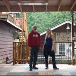 Ken Stange, owner of Bailey's corner, and Lauren Flynn, local musician, on Bailey's outdoor stage. (Photo by Rachel Rosen/Whidbey NEws-Times)