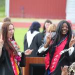 Photo by Karina Andrew/Whidbey News-Times
Graduates Isabelle Wells, left, and JaKenya Hoskins pose for a photo in the aftermath of the graduation ceremony.