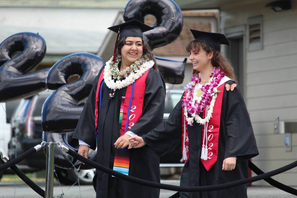 Photo by Karina Andrew/Whidbey News-Times
Graduates Kimberly Castro Sotelo and Noelle Daigneault walk into Coupeville High Schools commencement ceremony June 11.