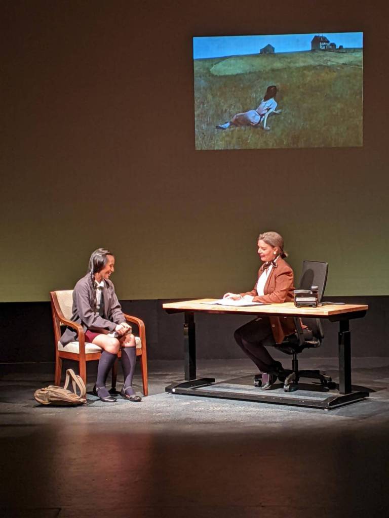 Photo by Sue Frause
Rheanna Atendido (Dezzy) and Melanie Lowey (understudy for Dr. Elsbeth Hatch) have a conversation in the headmistresss office.