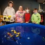 From left to right, Teddy Alexander, Ash Bystrom, Solomon Hilliard and Caleb Arndt with two ROVs built by Etta Cameron and Maisie Pendell and Turner Pendell, Nick Hammond and Charlie Cameron. (Photo by David Welton)