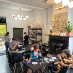 Meet Market visitors get creative in the open studio space, using donated art supplies that the market makes available for public use. (Photo provided)