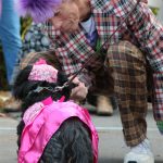 Jim Freeman emceed the Mutt Strut Dog Parade and Costume Contest at Bayview Corner from 2007 through 2017, where he took his duties very seriously. (Photo by Marian Myszkowski)