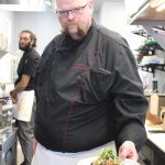 Gordon Stewart shows off one of the unique dishes from the Gordons Fusion menu. (Photo by Karina Andrew/Whidbey News-Times)