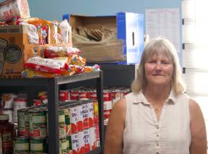 Jean Wieman in the North Whidbey Help House Food Pantry. (Photo by Rachel Rosen/Whidbey News-Times)