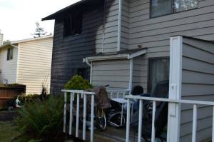 The back of an Oak Harbor duplex was scorched in a fire Saturday. (Oak Harbor Fire Department photo)