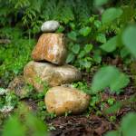 Stone cairns dot the landscape at Earth Sanctuary on Whidbey Island. (Ryan Berry / The Herald)
