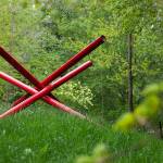 Compressed Cube Tensegrity is one of the first sculptures seen from the east parking lot at Earth Sanctuary on Whidbey Island. (Ryan Berry / The Herald)