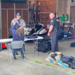 The Oak Harbor Police Department sorts through expired bulletproof vests.(Photo provided by Oak Harbor Police Department)