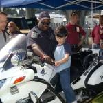 National Night Out has been happening in Oak Harbor for many years. A child gets to see a police motorcycle up close in this photo from 2011. (Photo provided by Oak Harbor Police Department)