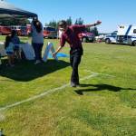 A participant wearing fatal vision goggles attempts to walk in a straight line at last year's National Night Out. (Photo provided by Oak Harbor Police Department)