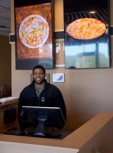 Jamel Hale, the owner of Hales Kitchen, in the restaurants new location. (Photo by Rachel Rosen/Whidbey News-Times)