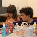 Photo by Karina Andrew/Whidbey News-Times
Children paint rocks during an art class at Whidbey Island Crafters Market and Studios.