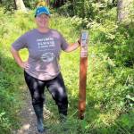 Photo by Harry Anderson
Whidbey Camano Land Trust Stewardship Director Jessica Larson stands before the new trailhead.