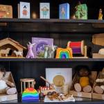 Photo by David Welton
Besides clothes, customers can also find dolls and wooden toys for their little ones.