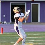 Brody Chowning fields the opening kickoff of the 2022 season. (Photo by John Fisken)