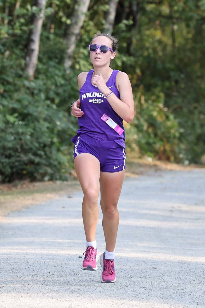 The Oak Harbor cross country girls team placed second at first league meet of the year on Sept. 14 at the Skagit Regional Airport Trails in Burlington, scoring 42 against home Burlingtons 26. Oak Harbors Adrienne Root (pictured) won the girls 5,000 meters race easily, finishing in 19:07, over two minutes ahead of the second place runner. Oak Harbor Junior Claire Paul was fourth overall with a time of 22:25.