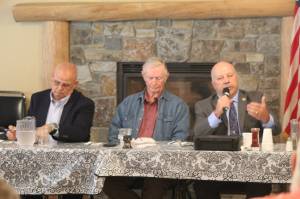 Photo by Karina Andrew/Whidbey News-Times
Island County Sheriff Rick Felici addresses the group at an Old Goats  Fully Informed Voters forum while candidate Lane Campbell, left, and moderator Rufus Rose, middle, listen on Sept. 16.