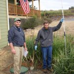 Photo by Rachel Rosen/Whidbey News-Times
Ben Miller (left) and his brother Seth (right) own Whidbey Septic. Their business involves inspecting and maintaining septic systems. Seth holds a core sampler that is used to see the contents of a septic tank.