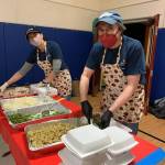 Photo provided
Jennifer and Paul Morris assemble meals for Mobile Turkey Unit last year.