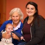 Photo by David Welton
Midwife Cynthia Jaffe, left, closed the Greenbank Birth Center in August and officially retired in October after her last postpartum check-up. She delivered both Bailey Pace, right, and Paces 2-month-old son, Tommy.