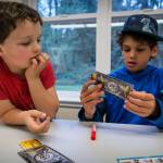 Miles Guggenheim, 9, right, attempts a trick while Dylan Gluckman-Oskin, 7, looks on.