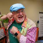 Photos by David Welton
Magician JR Russell attempts to pull something out of his ear. For the past eight years, Russell has been teaching magic to kids with a side of life skills.