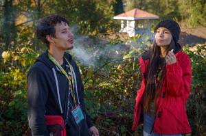 Photo by David Welton
Whidbey Island Cannabis budtenders Anthony Banks and Kati Sinclair enjoy a puff on their work break.
