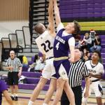 Photo by John Fisken
From left, Oak Harbor basketball players Noah Turner and Lee Shimieleski vie for the ball during a scrimmage at Night Out with the Cats Saturday.