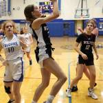 Photo by John Fisken
Coupeville athlete Lyla Stuurmans takes a shot at a Nov. 30 game against South Whidbey High School. Coupeville defeated South Whidbey 46-22.